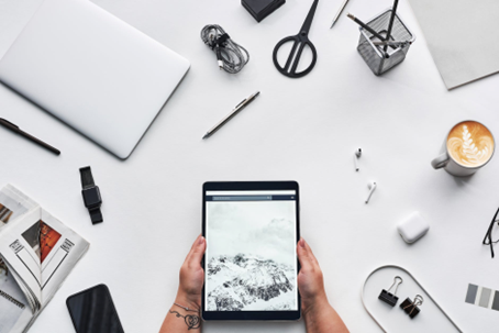 Office desk with different tools and devices